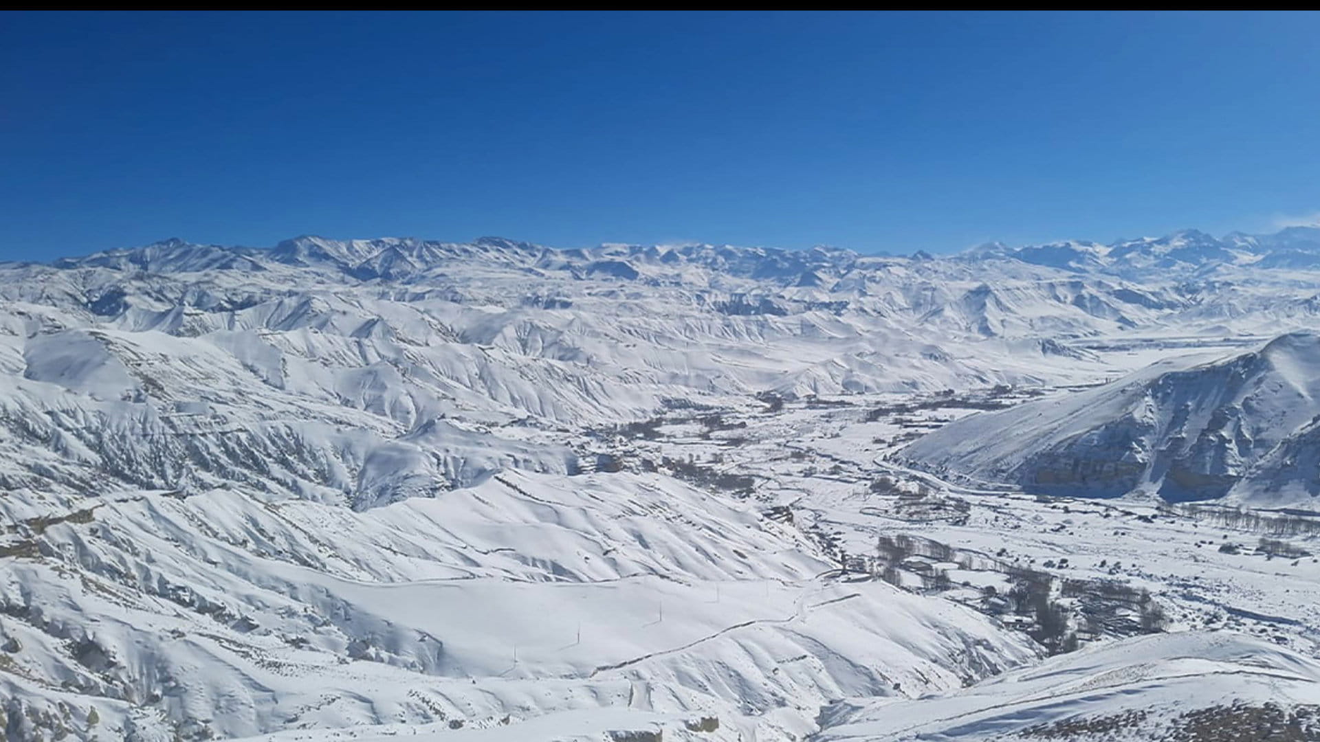 हिउँले छपक्कै उपल्लो मुस्ताङ, छोसेर गाउँ सेताम्मे image